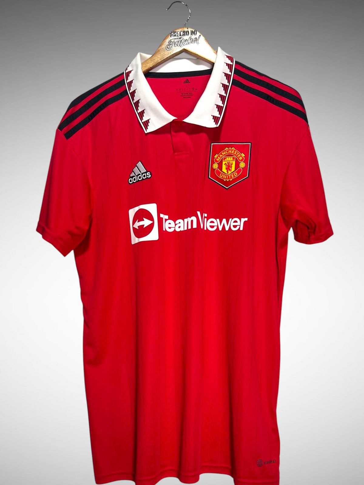 Manchester United 2022 Primeira Camisa Tam G.