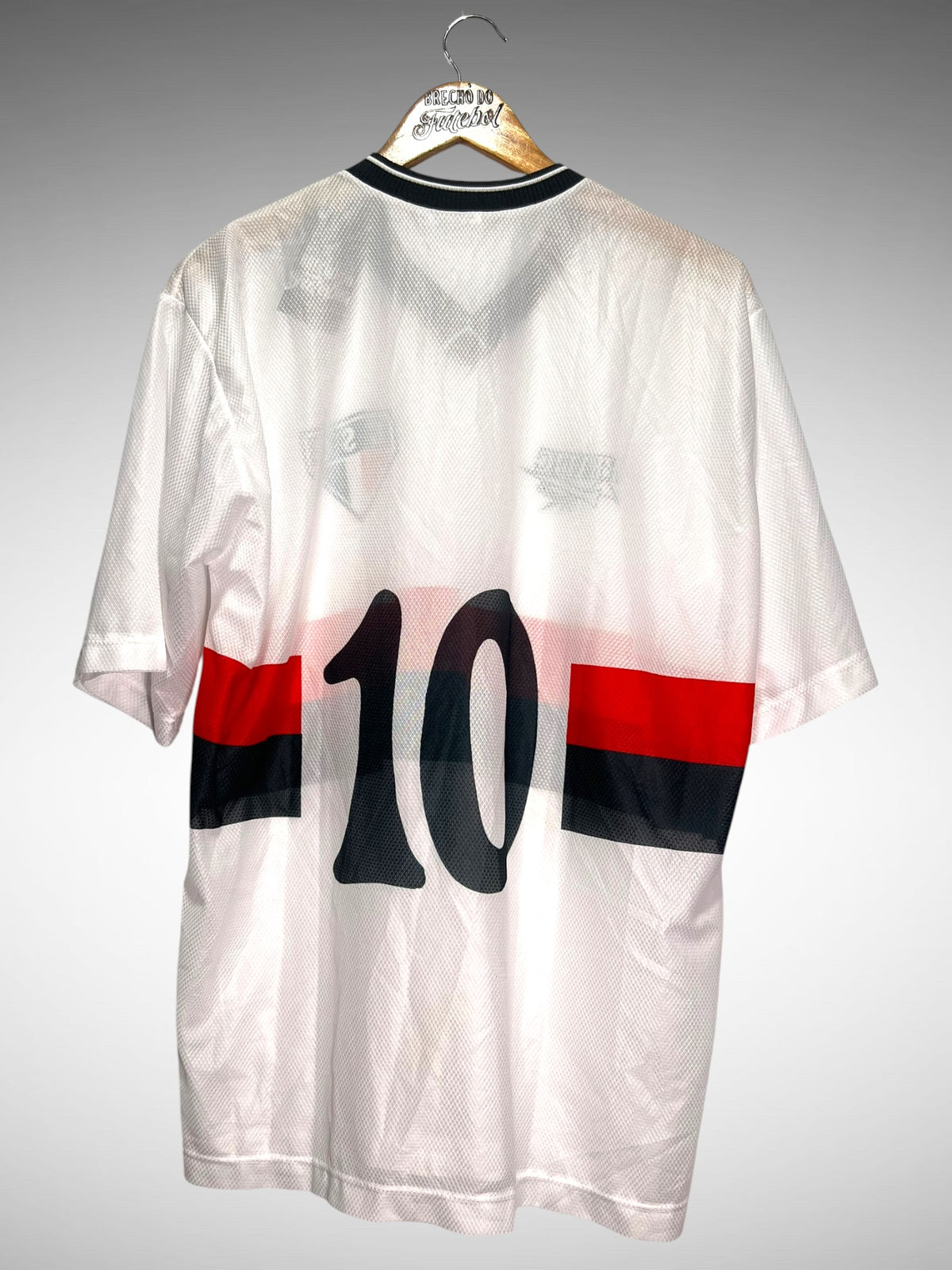 Comercial de Muqui Primeira Camisa Tam GG N 10.